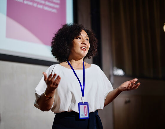 Woman speaker at conference